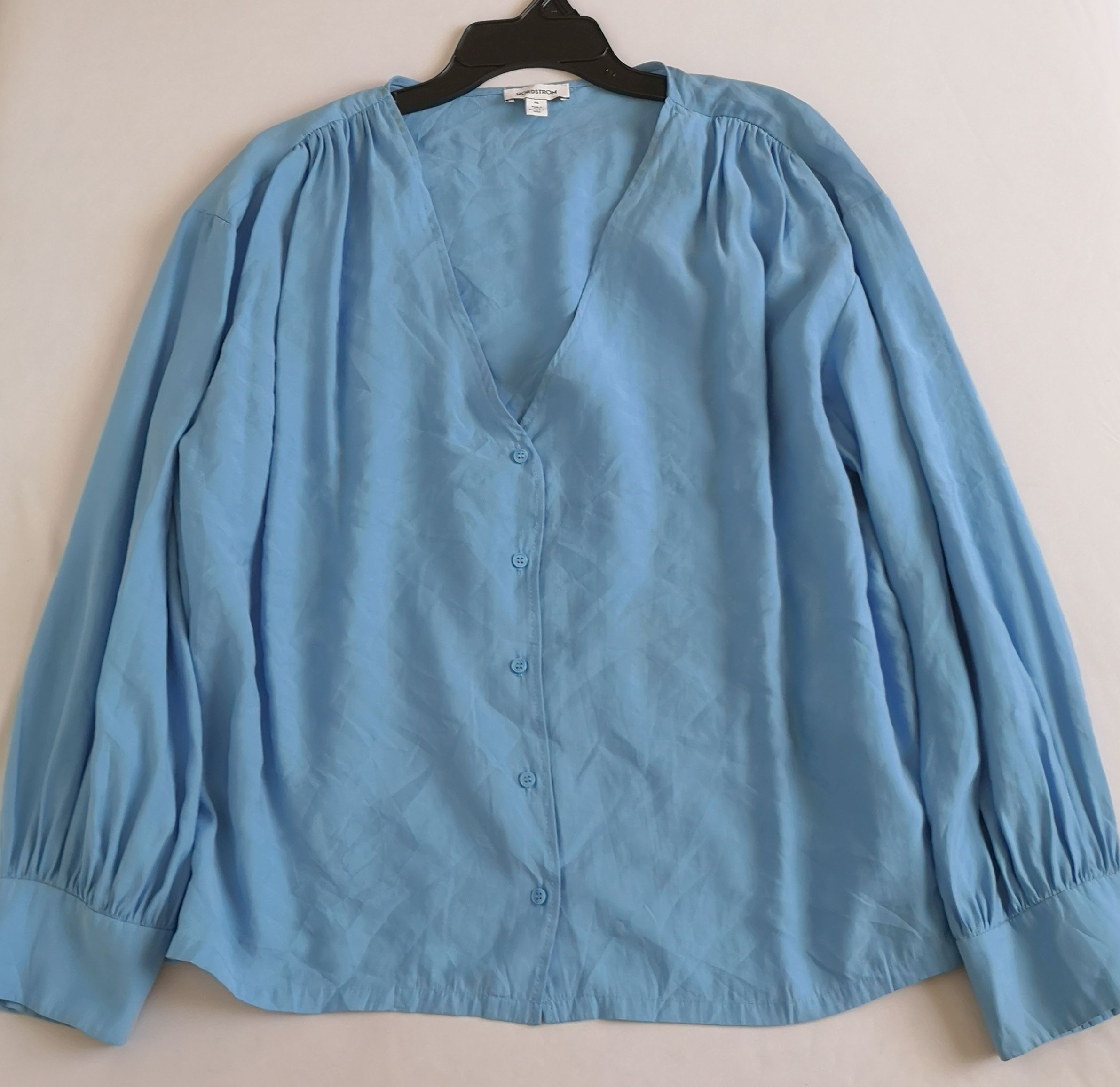 Blusa mangas bombachas y pantalón con bolsas