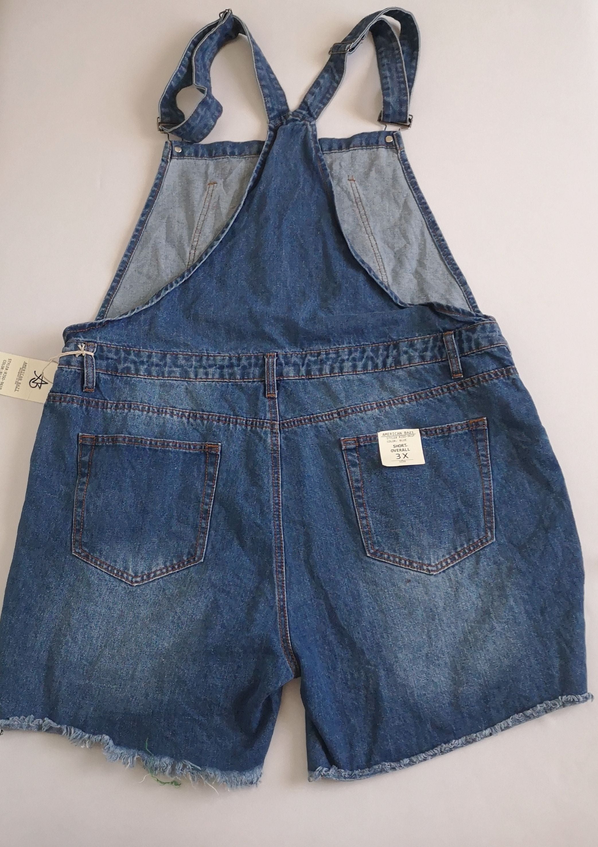 Overol nuevo rasgado