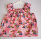 Blusa con elástico y short rasgado