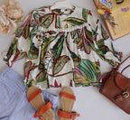 Blusa con botones atrás