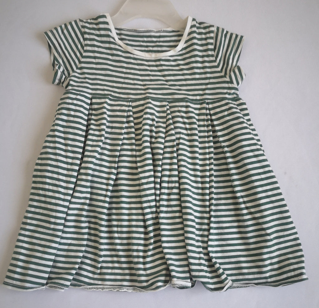 Vestido con bolsas a los lados incluye ganchitos