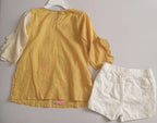 Short de algodón y blusa bordada