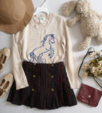 Suéter largo y falda con paletones