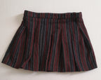 Suéter largo y falda con paletones