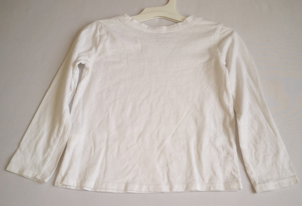 Blusa manga larga y pantalón con detalles en la tela