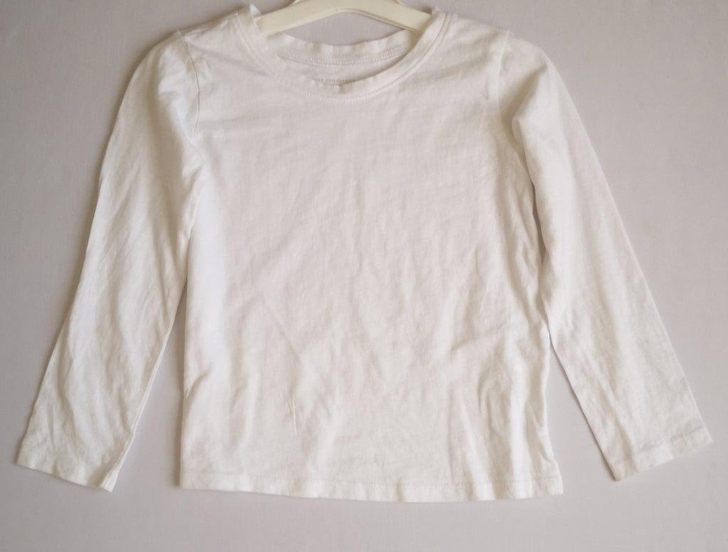 Blusa manga larga y pantalón con detalles en la tela