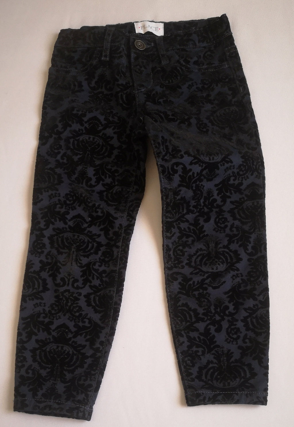 Blusa manga larga y pantalón con detalles en la tela