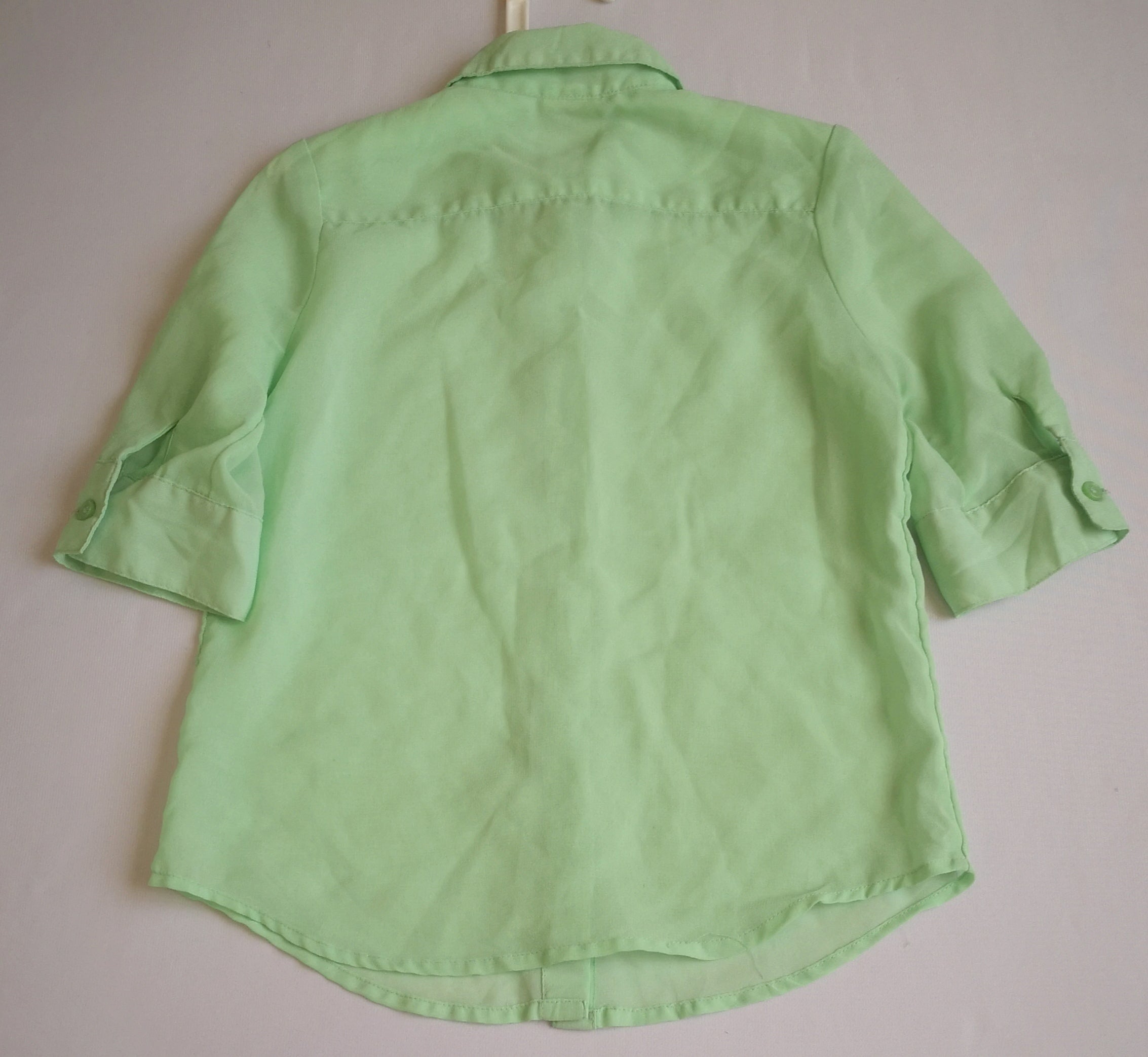 Blusa y falda con bolsas a los lados