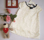 Vestido con detalles en la tela