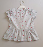 Blusa tipo peplum incluye pulseras