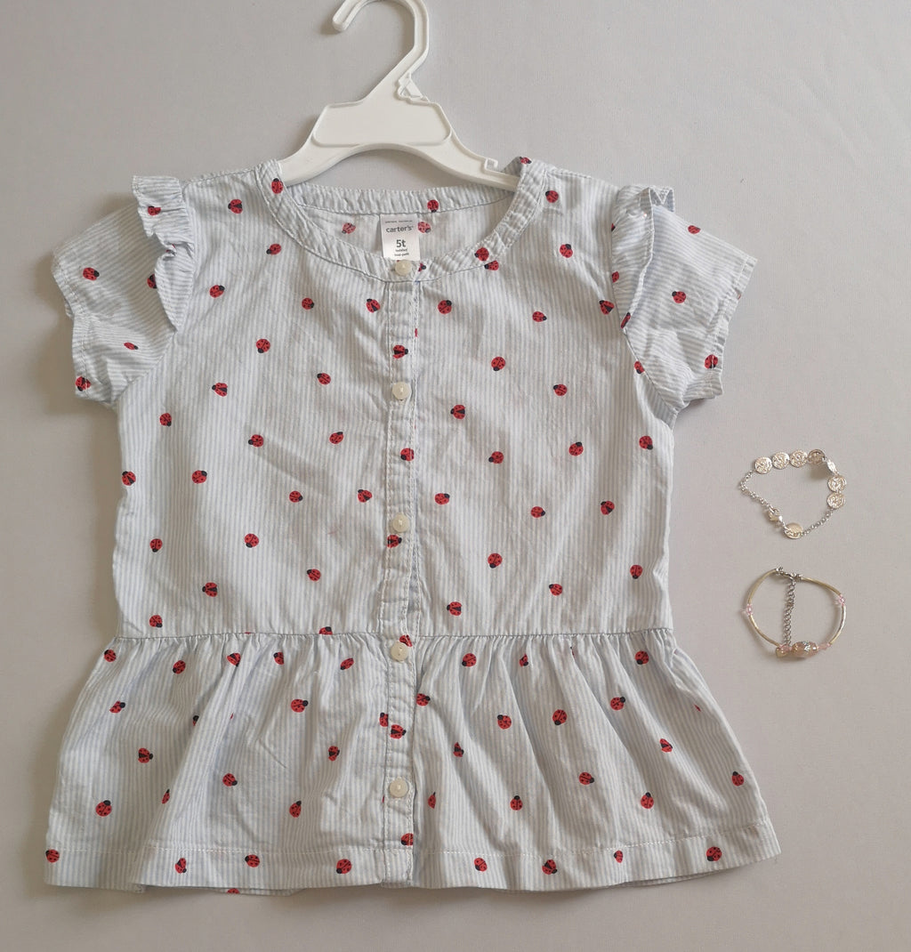 Blusa tipo peplum incluye pulseras