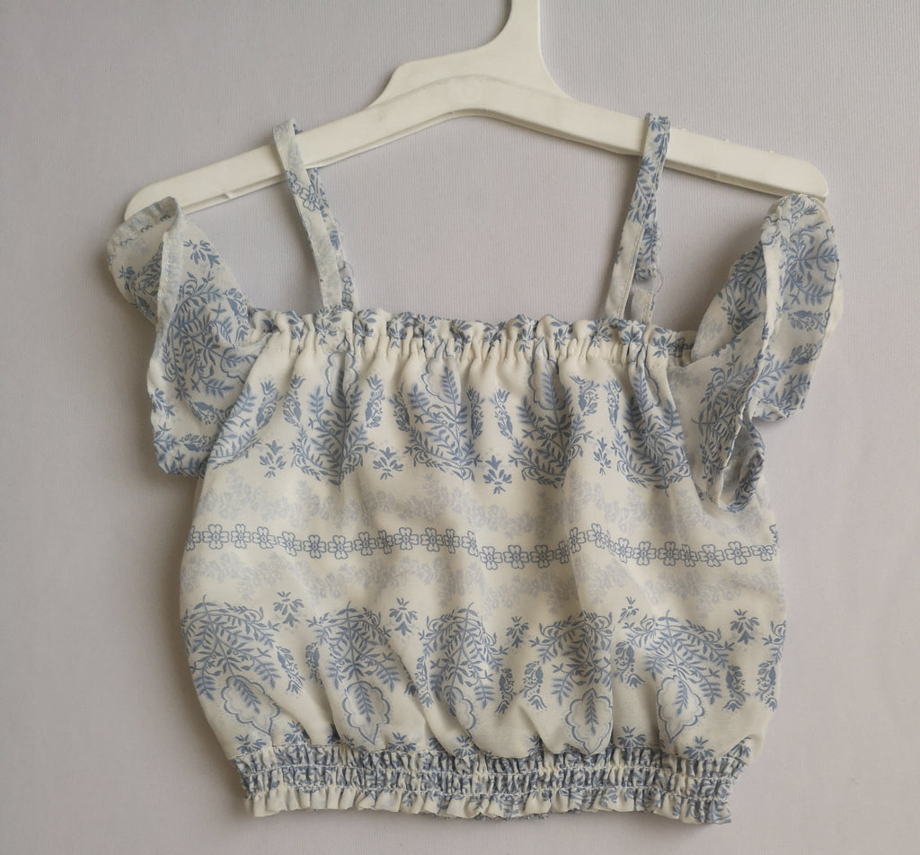 Crop top con pantalon
