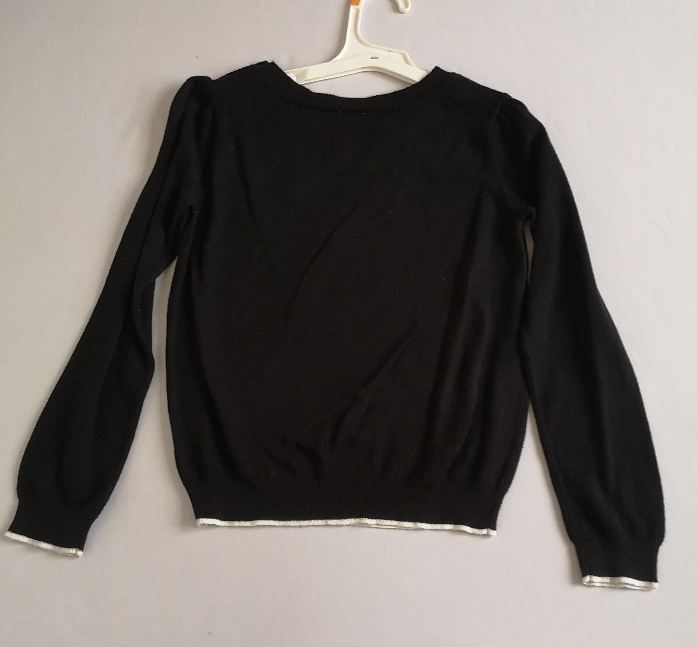 Suéter liviano incluye ganchitos