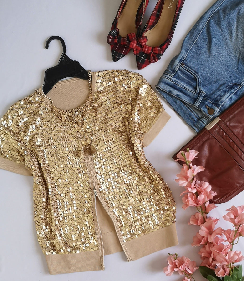 Blusa con zipper bordado con lentejuelas