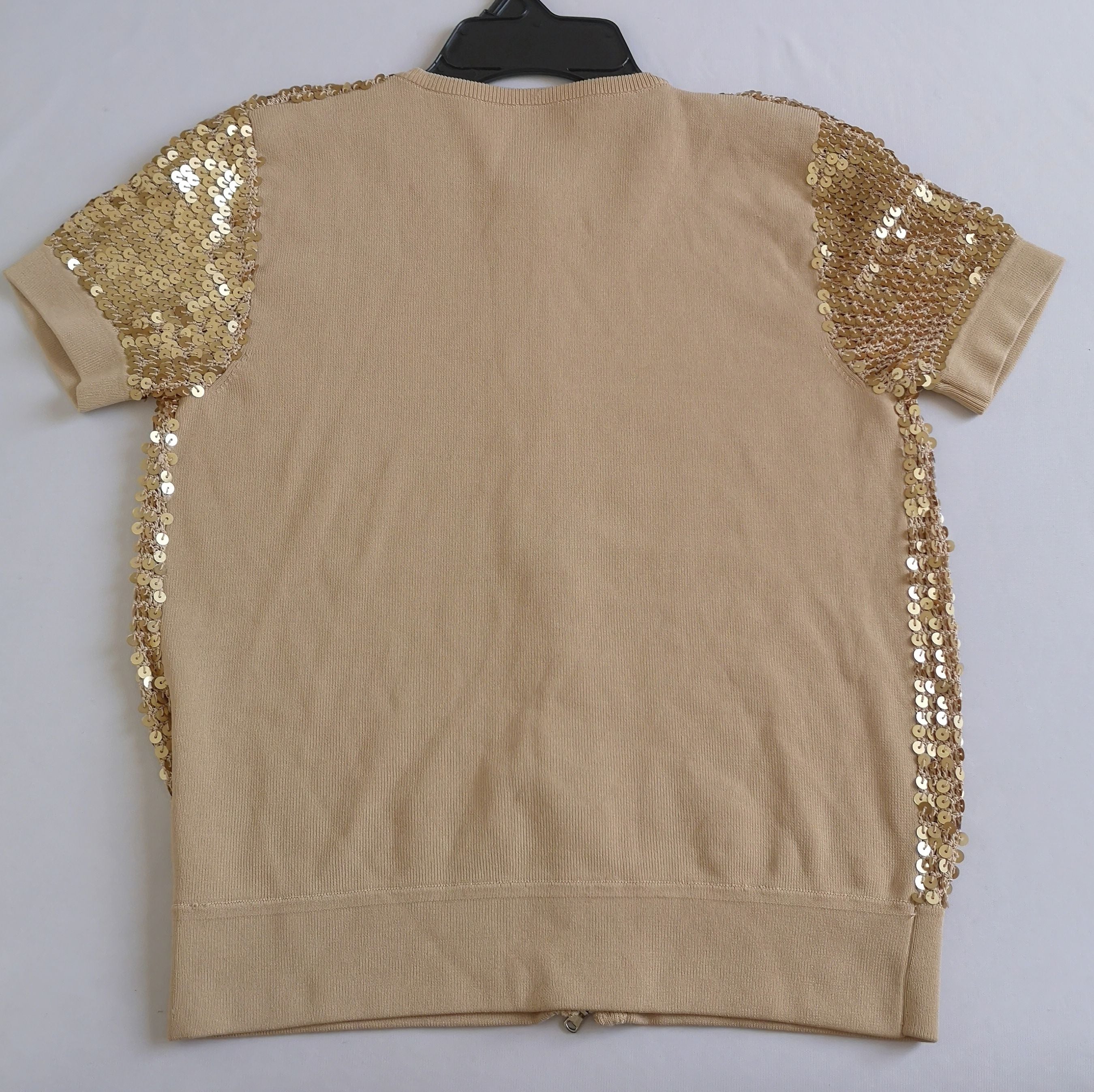 Blusa con zipper bordado con lentejuelas