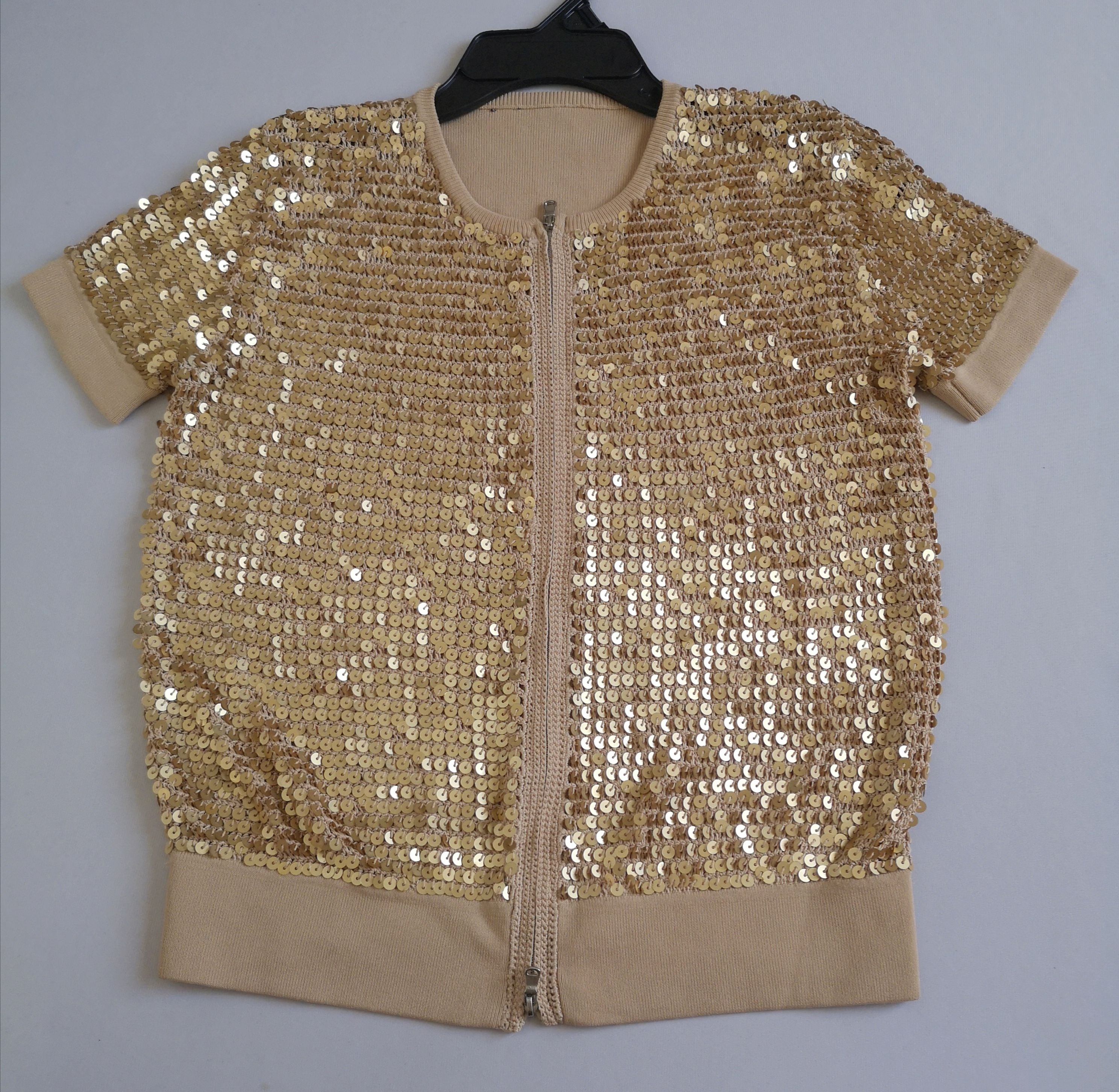 Blusa con zipper bordado con lentejuelas