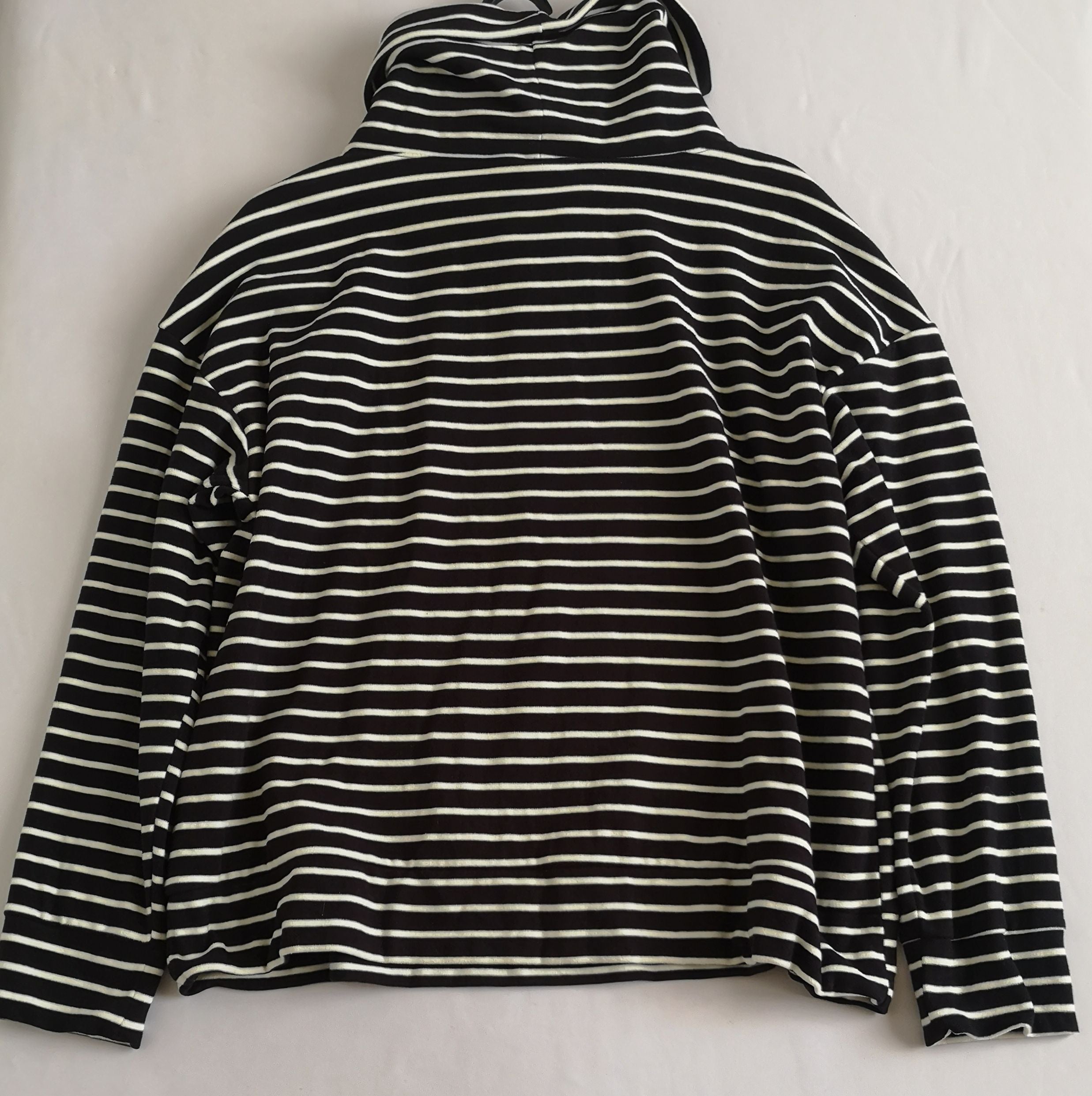 Suéter cuello ancho
