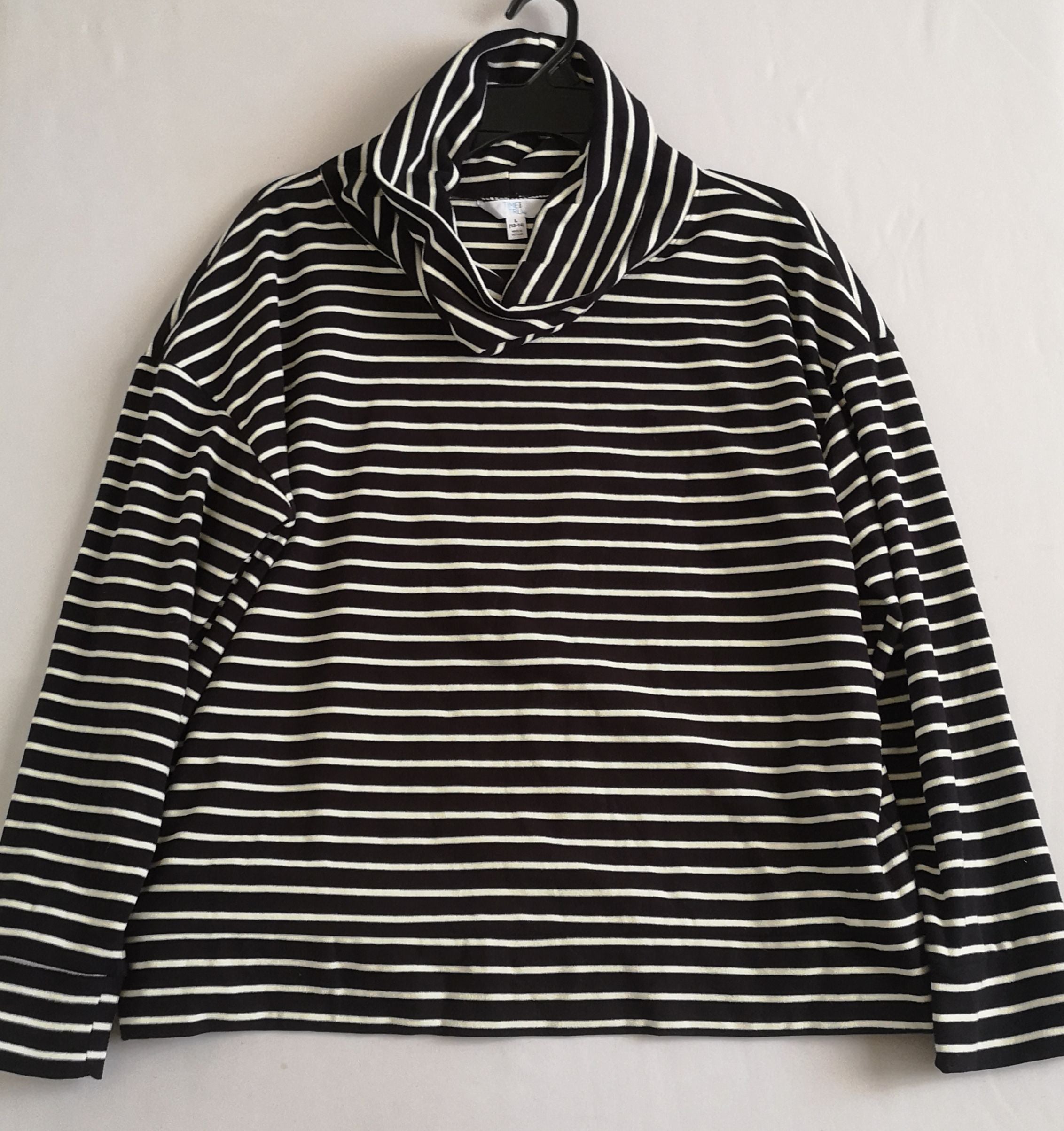 Suéter cuello ancho