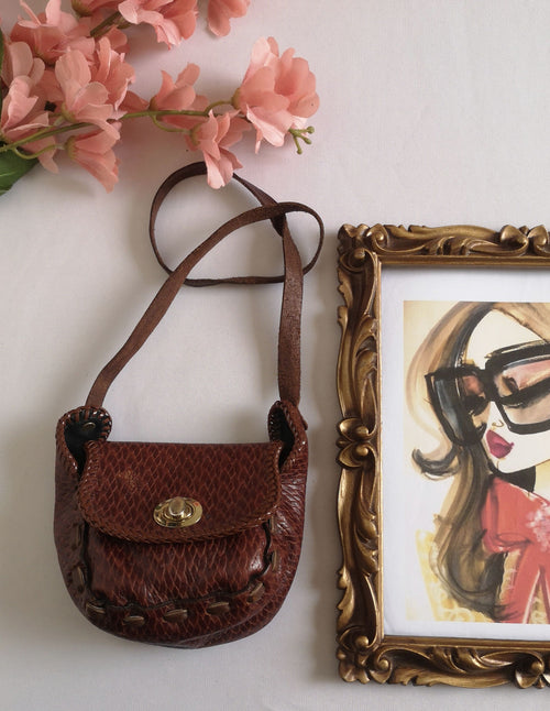 Cartera pequeña de cuero