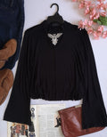 Blusa manga campana