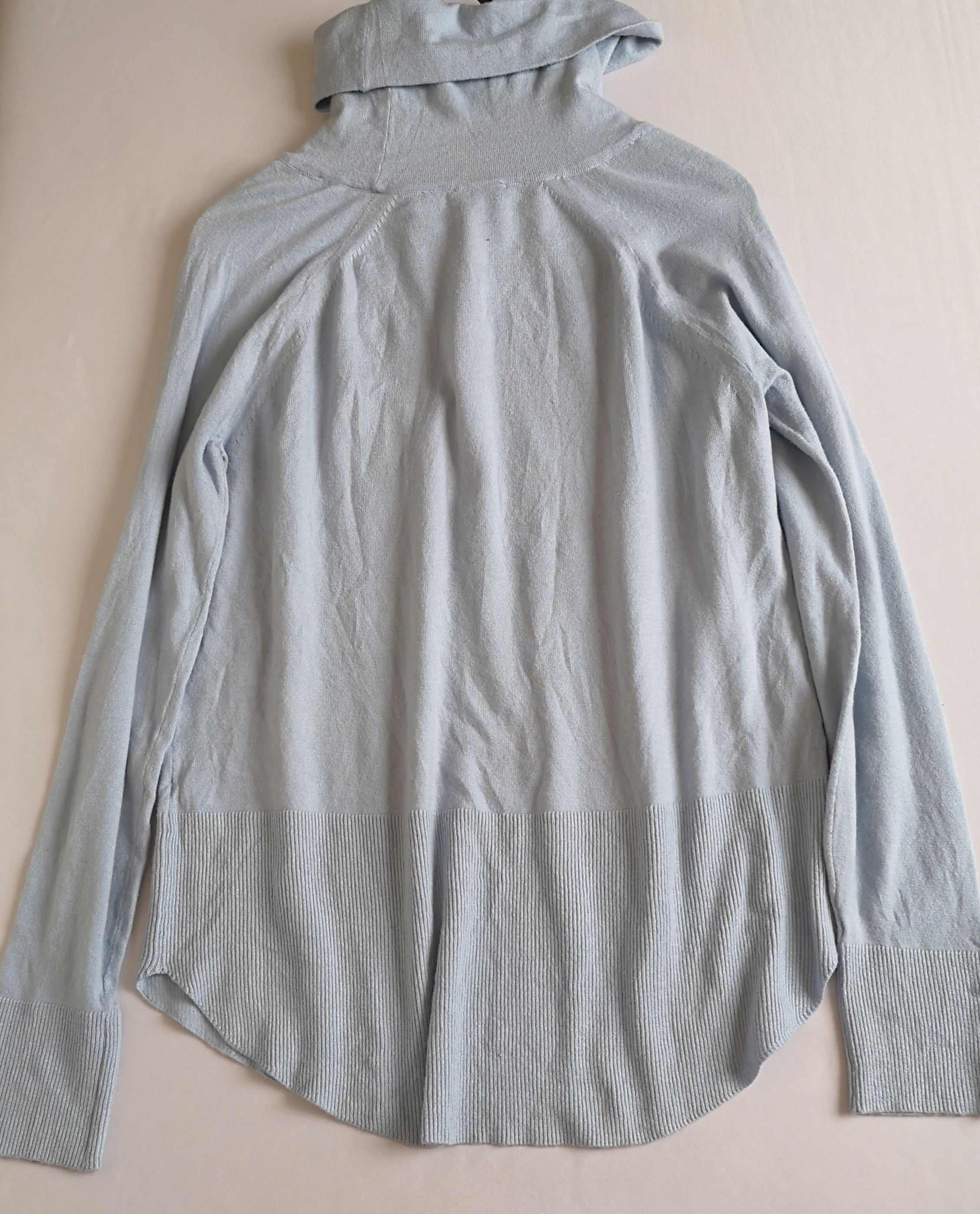 Suéter cuello ancho