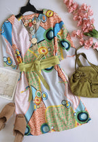 Vestido corte recto con bolsas adelante incluye cincho