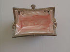 Cartera bordada pequeña