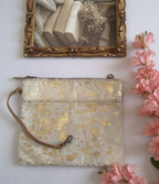 Cartera cuadrada de cuero