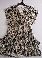 Vestido con olanes incluye collar