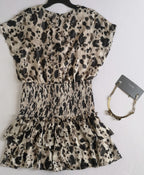 Vestido con olanes incluye collar