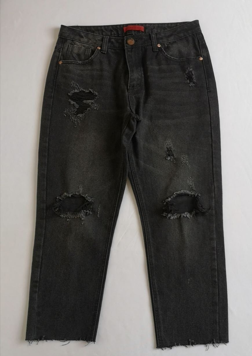 Suéter estilo over size y mom jeans