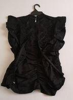 Blusa corrugada con zipper atrás