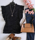 Blusa corrugada con zipper atrás