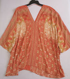 Blusa estilo ancho con short rasgado