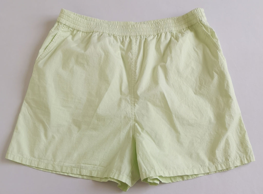 Short con bolsas a los lados y blusa