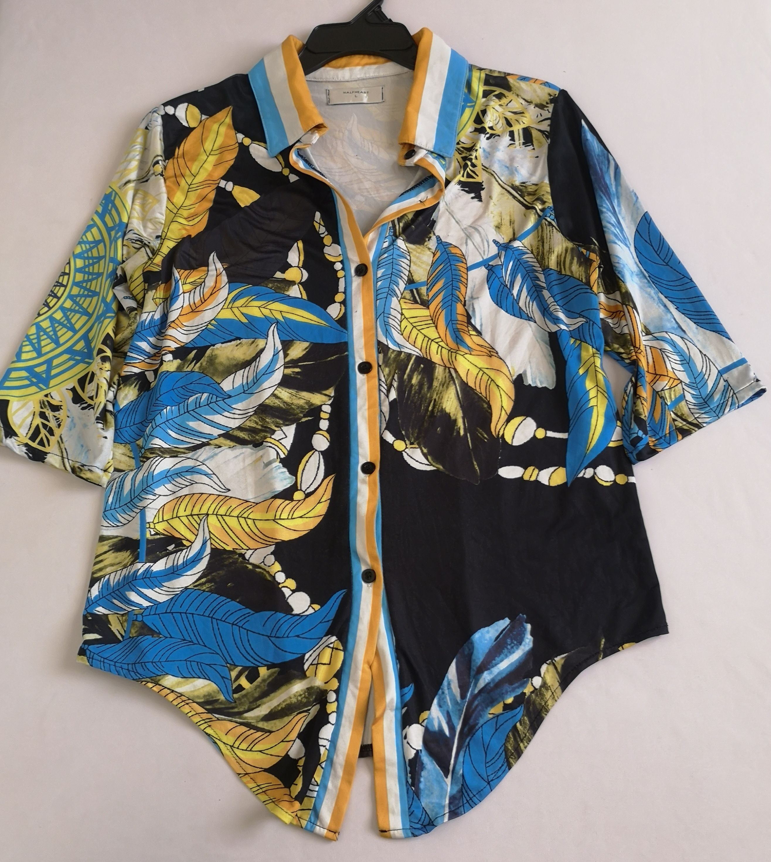 Pantalón de lino bordado y blusa 3/4