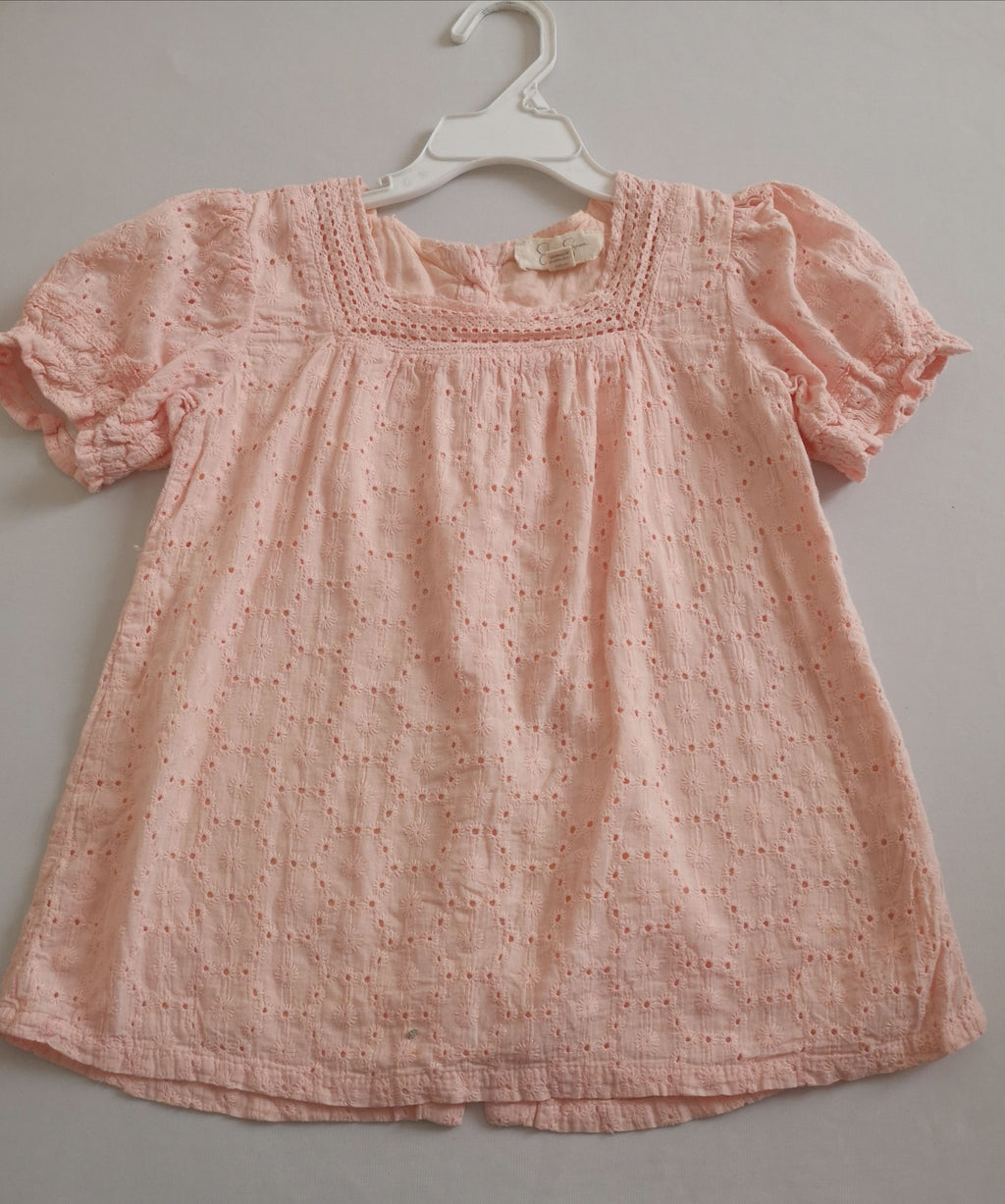 Blusa con botones atrás