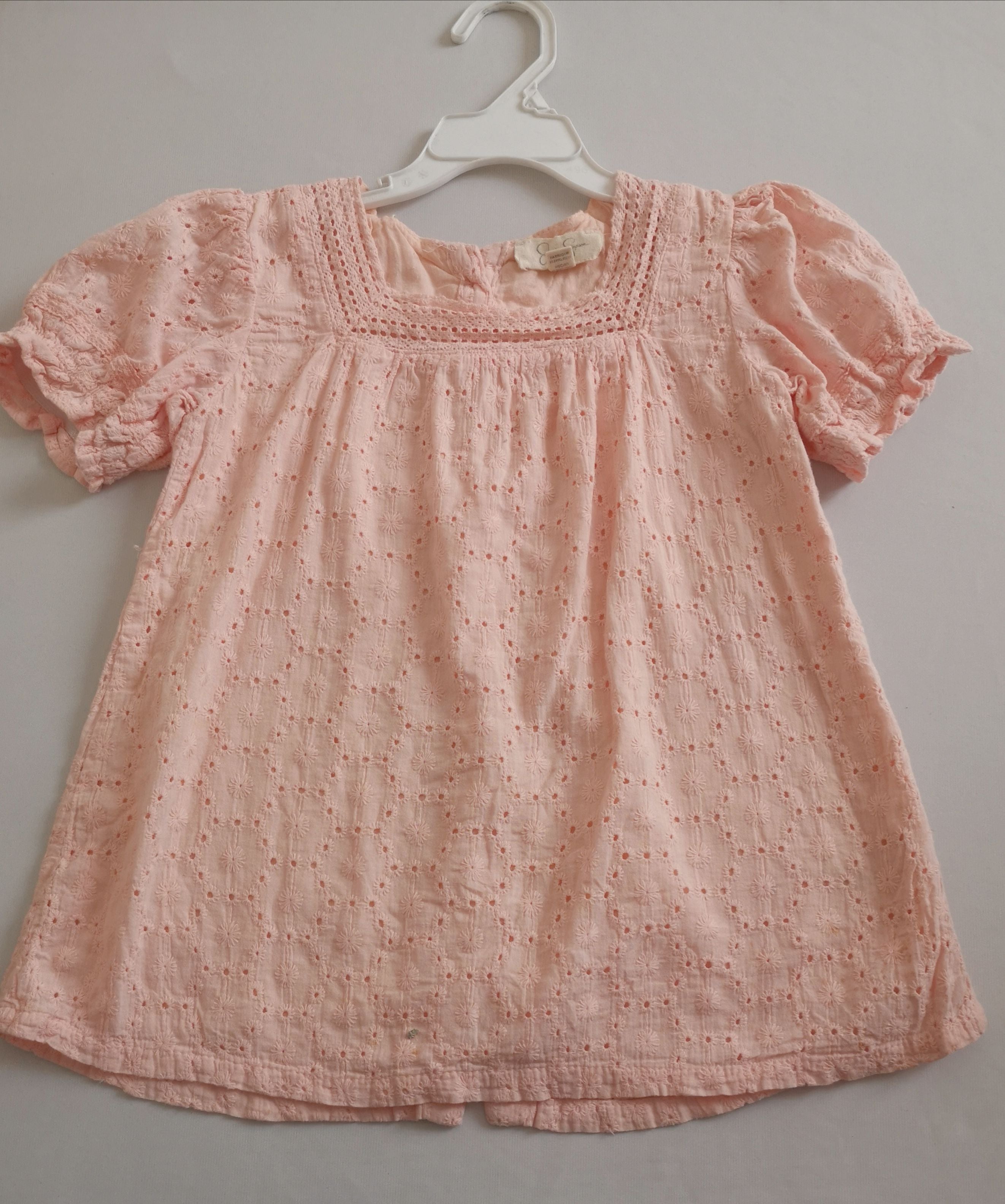 Blusa con botones atrás