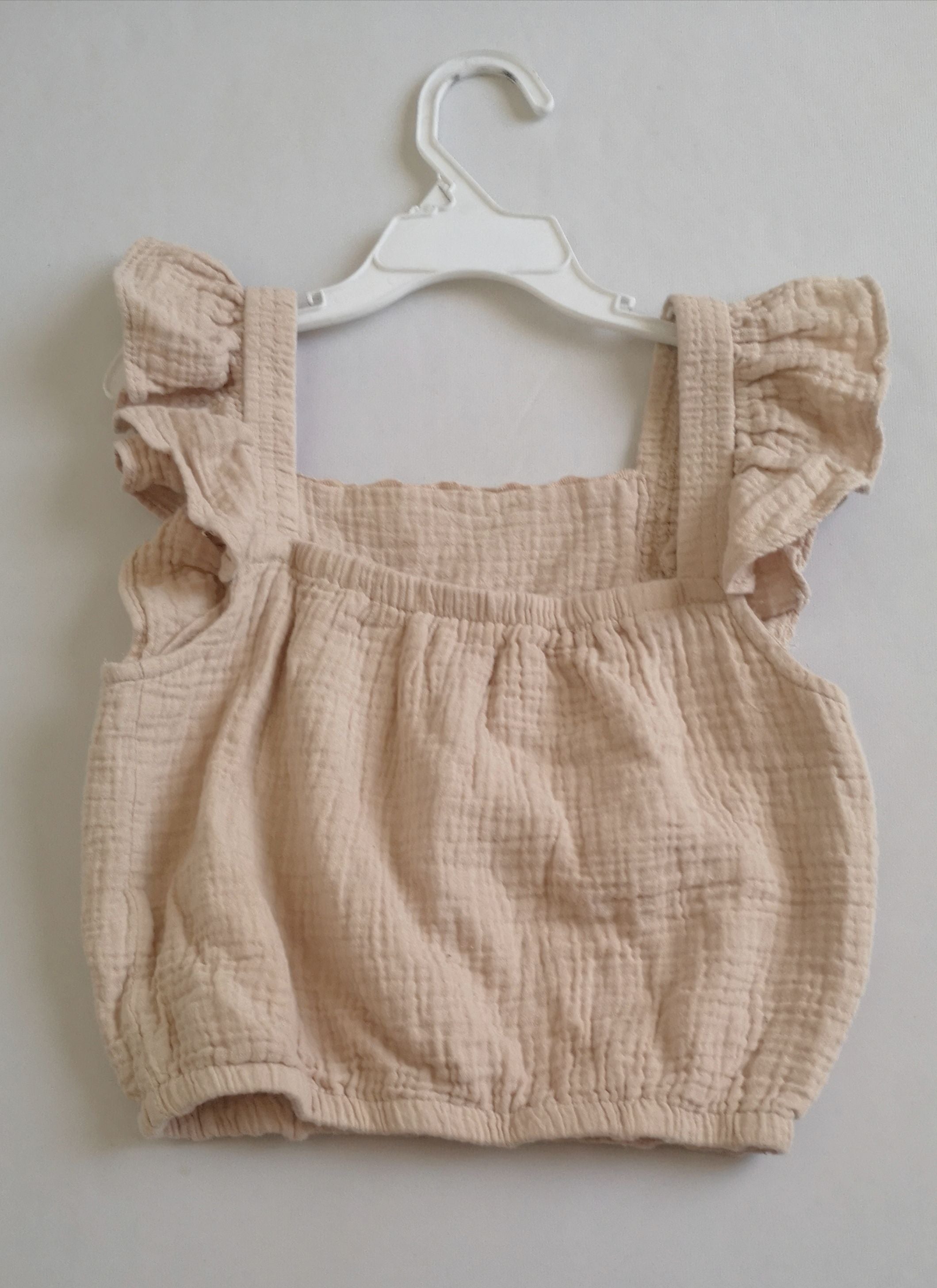 Blusa con elastico abajo incluye ganchitos