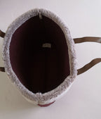 Cartera grande con peluchito arriba