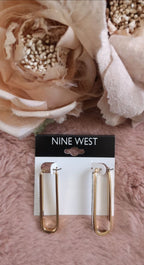 Aretes nine west