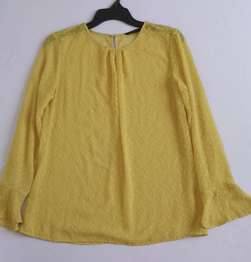 Blusa con bolitas en la tela