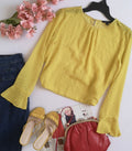 Blusa con bolitas en la tela