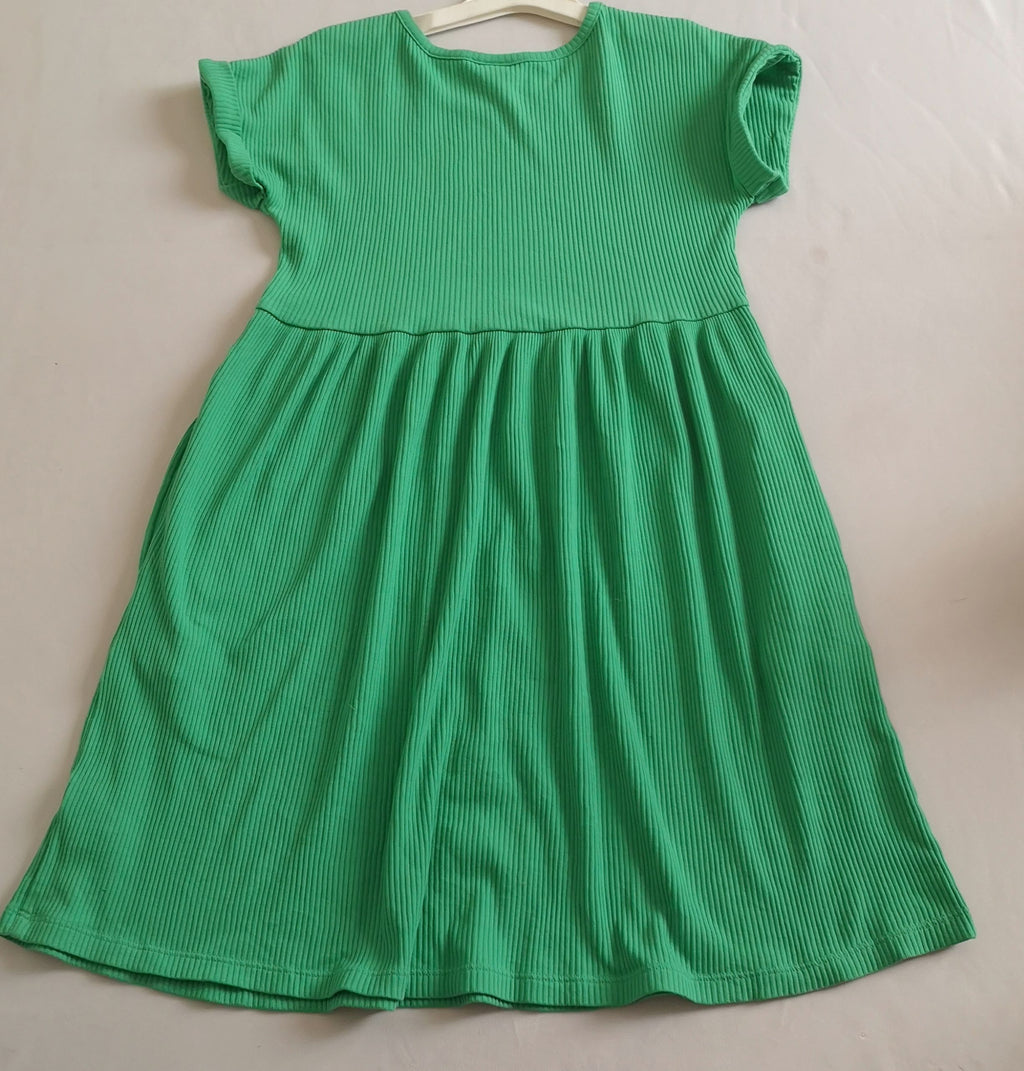 Vestido con bolsas a los lados incluye cincho