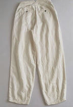 Pantalón slouchy cintura alta y crop top tejido