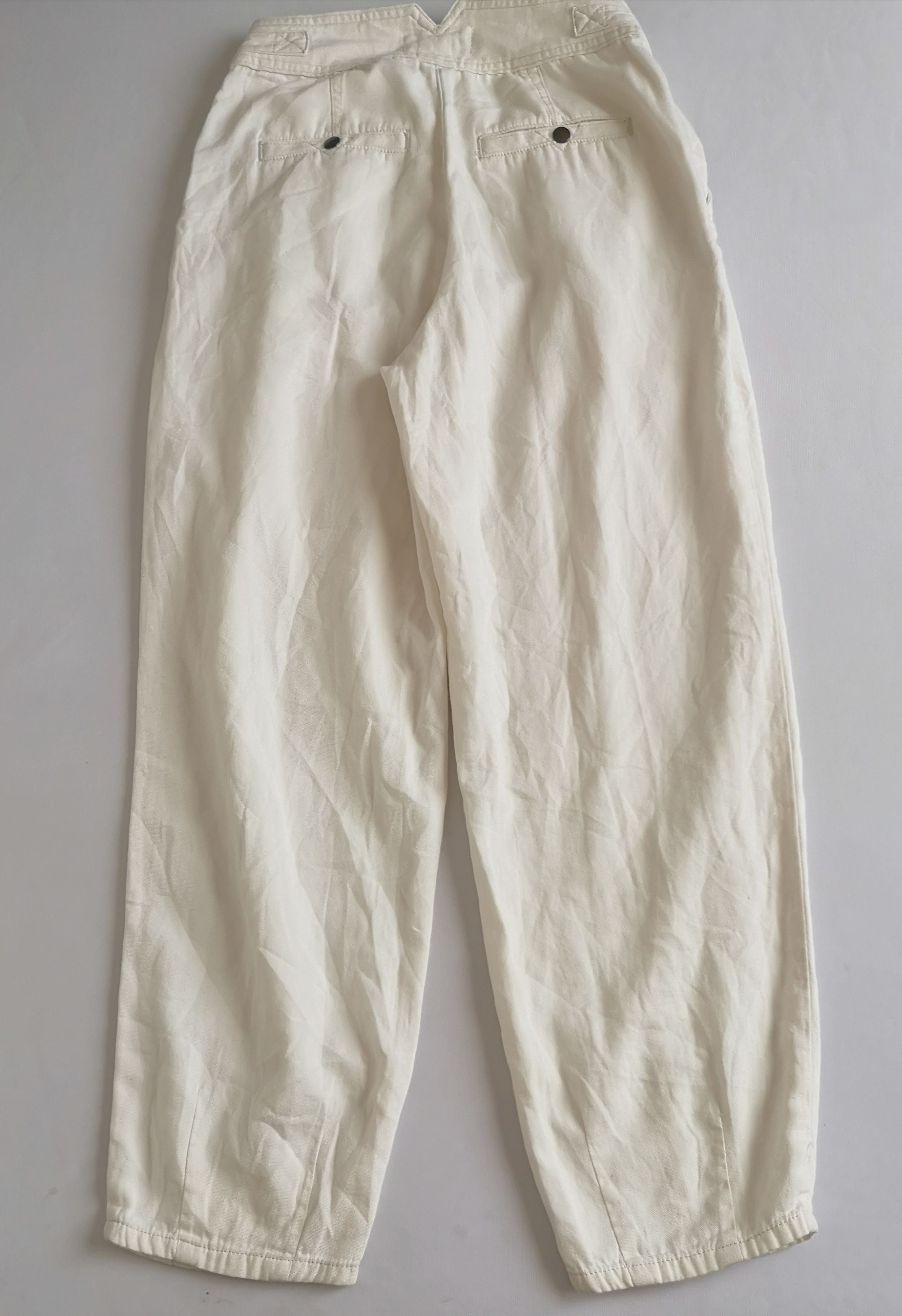 Pantalón slouchy cintura alta y crop top tejido