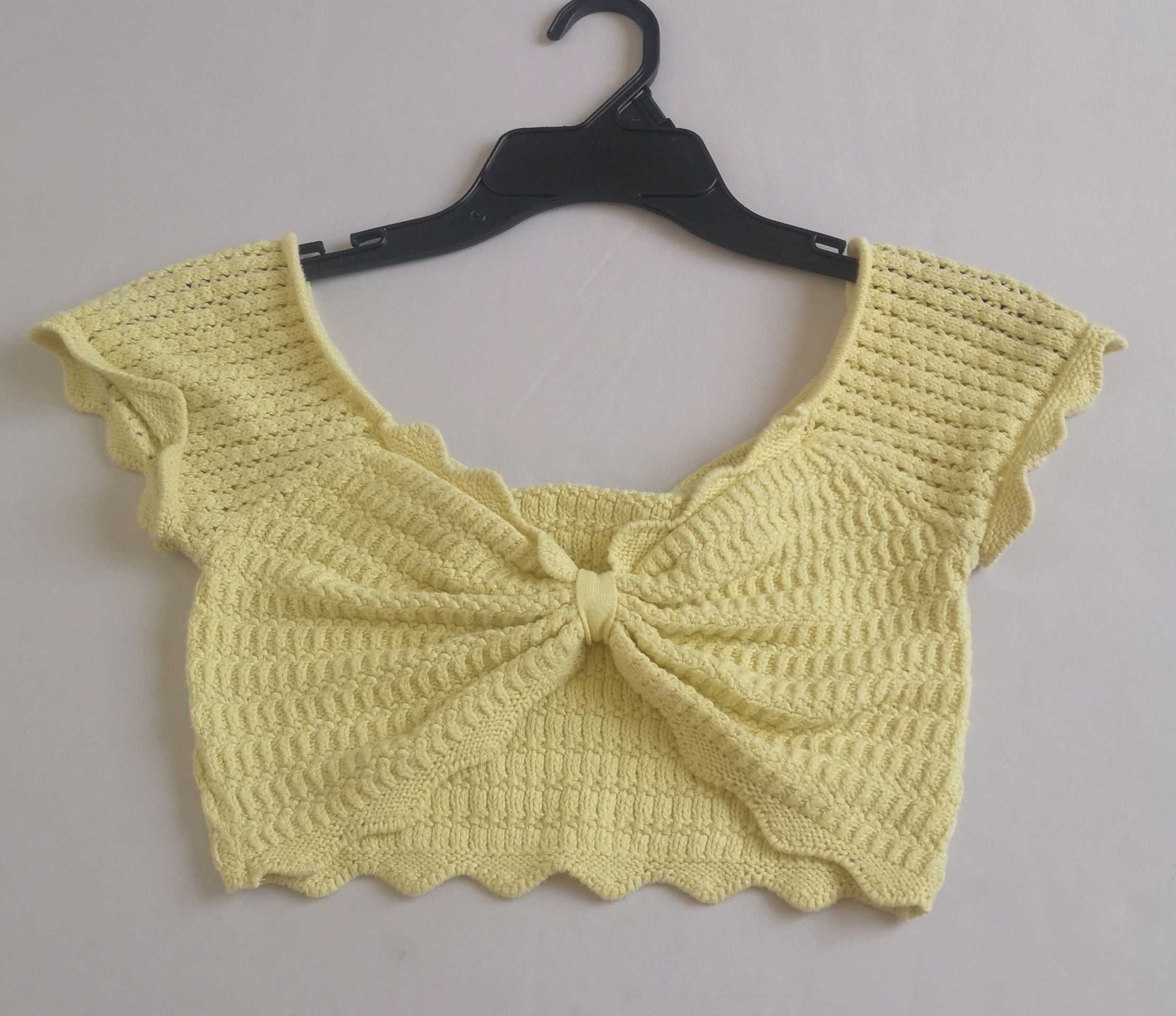 Pantalón slouchy cintura alta y crop top tejido