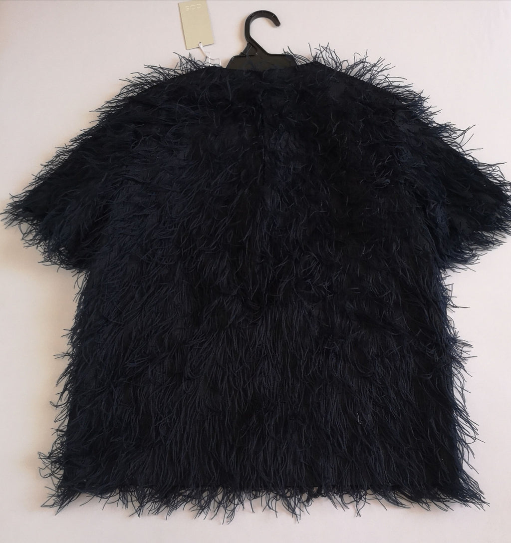 Blusa con flecos nueva