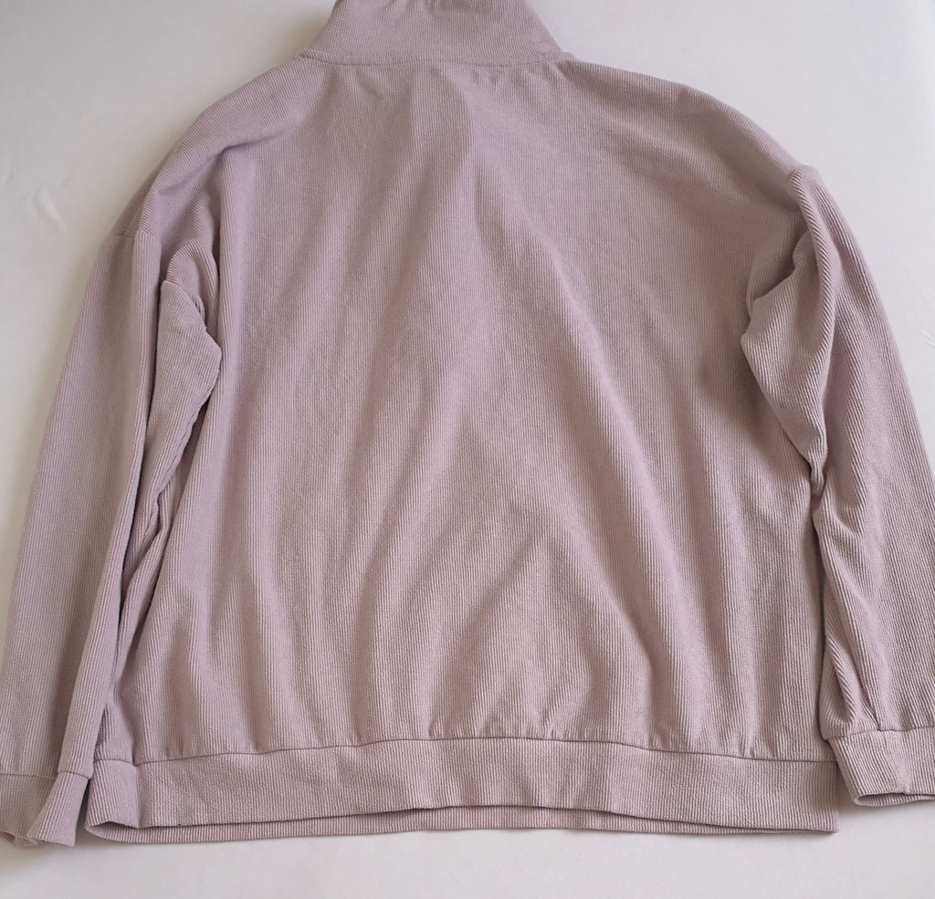 Suéter con zipper adelante
