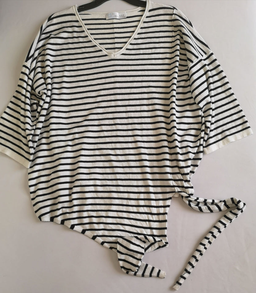 Palazzo y blusa con nudo